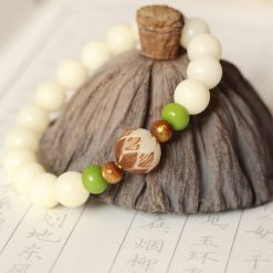 Chuỗi Vòng Đeo Tay Hạt Bồ Đề Charm Hoa Sen Màu Trắng Ngà, 10mm 4 chuoi vong deo tay charm hoa sen hat goc bo de mau trang nga 10mm 3