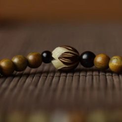Chuỗi Vòng Tay Quấn 2 Gỗ Đàn Hương Kết Hợp Charm Hoa Sen 4 chuoi vong tay go dan huong ket hop charm hoa sen 3