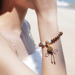 Vòng Tay Trầm Hương Mix Charm Đá Trụ Tròn Tây Tạng Trắng 6mm 13 L1050842
