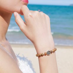 Vòng Tay Trầm Hương Mix Charm Bánh Xe Pháp Luân Bạc 6mm 6 L1050934 1