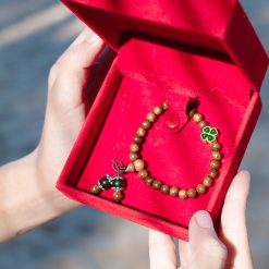 Vòng Tay Trầm Hương Tết Chữ Vạn Mix Charm Cỏ Bốn Lá Xanh 6mm 1 L1060076 1