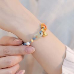 Vòng Đeo Tay Charm Hoa Sen Tinh Tế 4 vong deo tay charm hoa sen tinh te 3